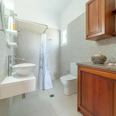 Iphigenia At * Κατελειός